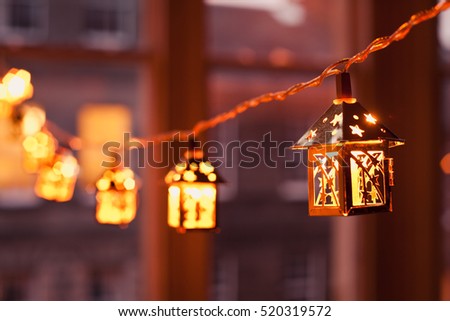 Christmas lanterns - bright evening lights.