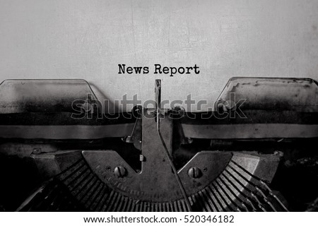 News Report typed words on a Vintage Typewriter.