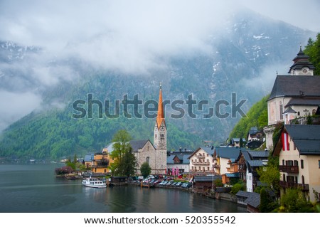 Scenic picture-postcard view of famous Hallstatt mountain village with Hallstaetter See in the Austrian Alps, region of Salzkammergut, Austria
