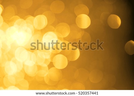 Gold and yellow Christmas Glittering background. Holiday abstract texture Festive