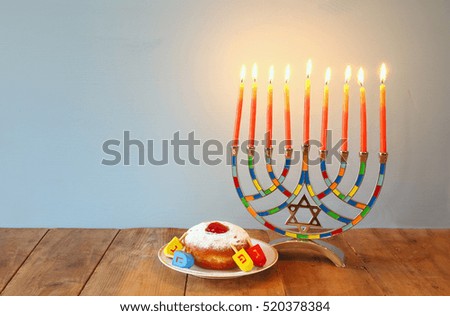 Image of jewish holiday Hanukkah with menorah (traditional Candelabra)