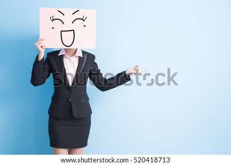 business woman take happy billboard and show something, isolated blue background