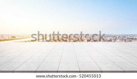 Empty marble floor top with panoramic modern cityscape building bird eye aerial view under sunrise and morning blue bright sky of fuji mount in Tokyo, Japan for display or montage product