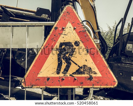 Vintage looking Warning signs, Road works traffic sign