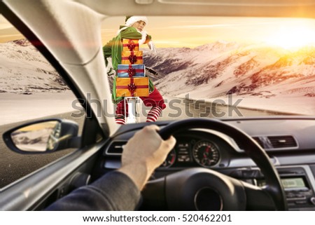 Fast car with driver in interior of car and elf on road 