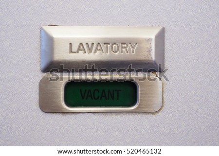 Vacant lavatory sign on the commercial airlines.