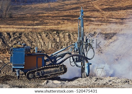 Drilling rig in operation. Mining.