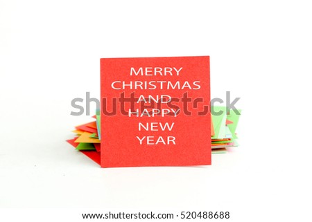 picture of a orange note paper with text merry christmas