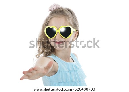 portrait of a little girl in yellow sunglasses on a white background