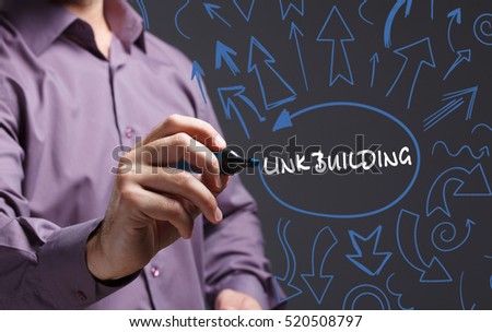 Technology, internet, business and marketing. Young business man writing word: link building