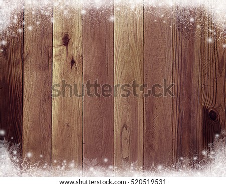 Old wooden texture with snow and frost. Top view. Christmas background. Retro. New Year.