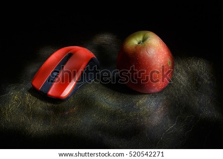 Computer mouse and an apple