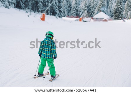 Boy skiing. Little boy skiing on mountain on sunny day
