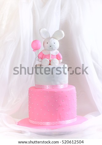 Baby girl cake for first Birthday with rabbit & balloon