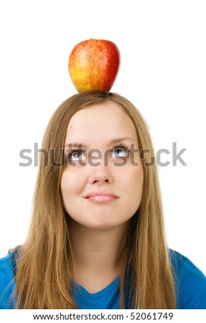 portrait of thoughtful woman with apple on her head, over white