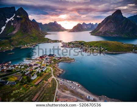 Lofoten islands is an archipelago in the county of Nordland, Norway. Is known for a distinctive scenery with dramatic mountains and peaks, open sea and sheltered bays, beaches and untouched lands. Royalty-Free Stock Photo #520670536