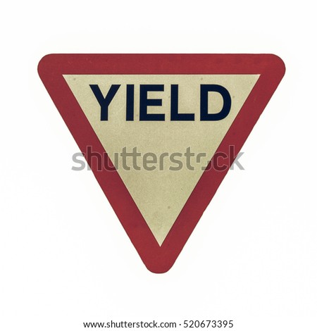 Vintage looking Give way or yield traffic sign isolated