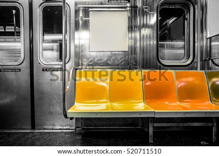 New York City subway car interior with colorful seats Royalty-Free Stock Photo #520711510