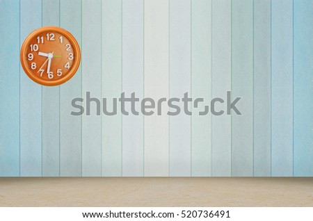 Empty room and pastel orange saffron wall clock pastel blue Showroom and perspective wooden floor 
