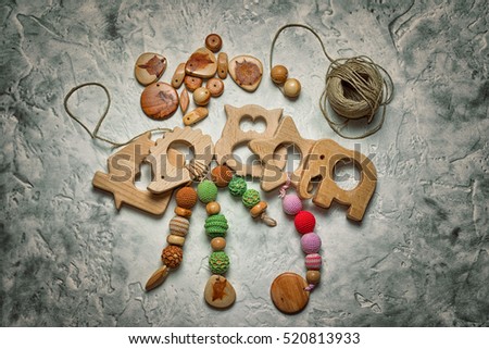children's wooden toys, and a coil of rope with wooden parts for their manufacturing. needlework.