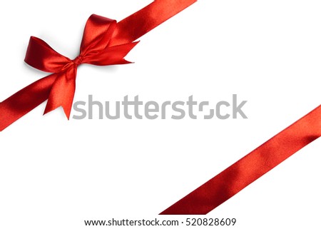 Red ribbon bow isolated on white background. Studio shot