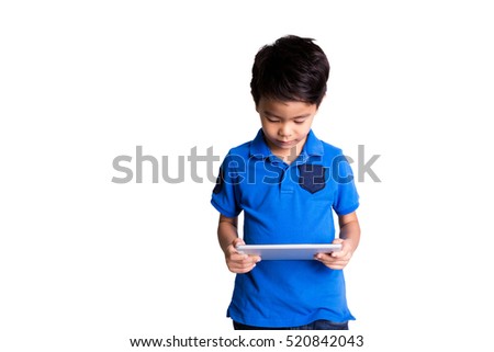 Little boy playing on tablet isolated on white background