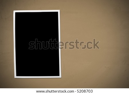 Developing picture. Isolated on brown background.