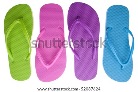 Vibrant colored summer flip flops isolated on white with a clipping path. Royalty-Free Stock Photo #52087624