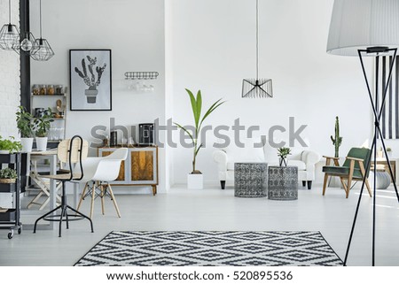 White loft interior in scandinavian style with pattern carpet Royalty-Free Stock Photo #520895536