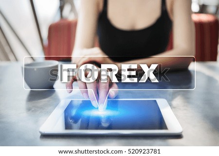 Woman using tablet pc and selecting forex.