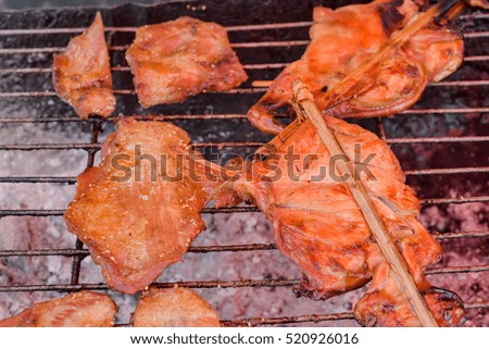 Chicken breasts on a grill, real picture