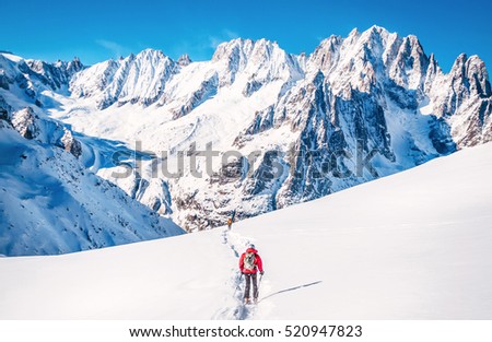 Skier in mountains. Winter mountain sport