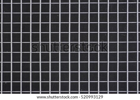 A studio photo of a wire metal background