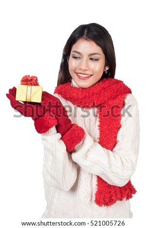 Santa Christmas woman holding christmas gift smiling happy and excited. Cute beautiful multi-racial Caucasian Asian santa girl isolated on white background with  clipping path