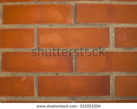 Texture of a wall with orange bricks