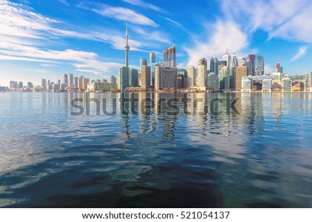 Beautiful Toronto skyline with CN Tower over lake. Canada.