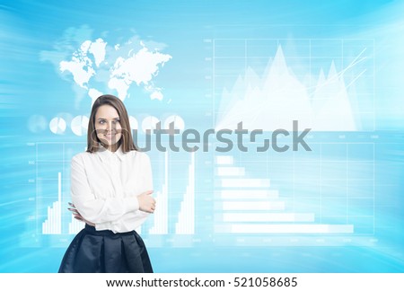 Woman hugging herself in a blue room with holographic images. Concept of the future and high tech. Double exposure. Elements of this image furnished by NASA
