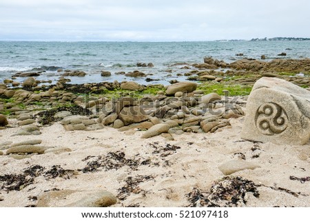 coast in Brittany, rock cliff , ocean, sea  art,sculpture, Sculpture on stone Royalty-Free Stock Photo #521097418