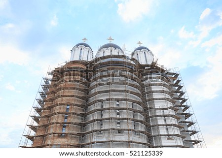 Orthodox Church Under Construction on blue sky background