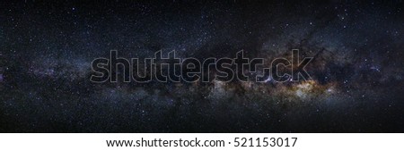panorama milky way galaxy on a night sky, long exposure photograph, with grain.
