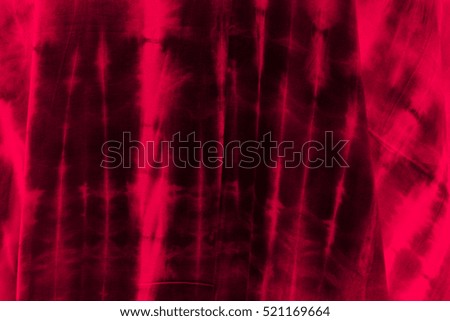 Blurred tie dyed pattern on cotton fabric for background