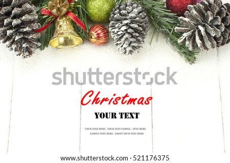 Christmas background with decorations on white wooden board. Christmas border with decoration ornaments. Top view of christmas border.Traditional christmas decoration with copy space. Royalty-Free Stock Photo #521176375