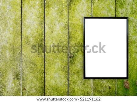 blank poster photo frame on abstract wood wall