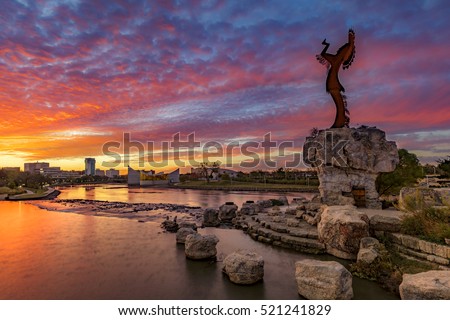 Keeper of the Plains and City Skyline at Sunrise