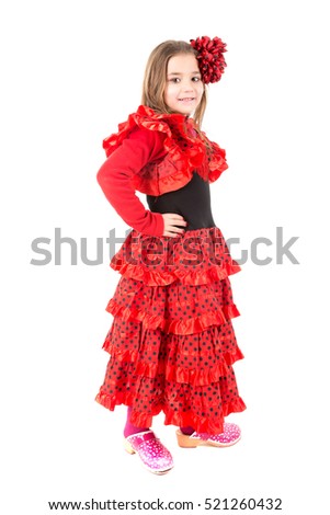 Young girl in Spanish dancer costume isolated in white