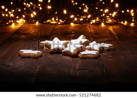 Christmas cookies and decoration on wooden table