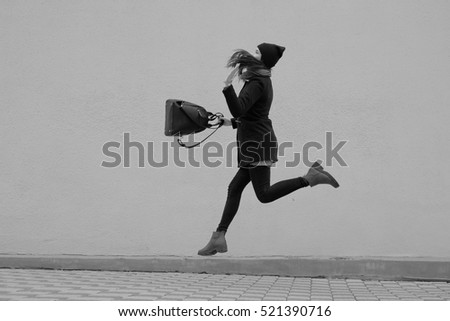 Girl jumps with joy