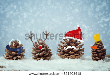 pine cones add cartoon Christmas and winter accessories on the snow with falling snow, xmas concept