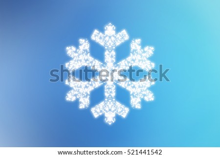 Snowflake on blue defocused Christmas background