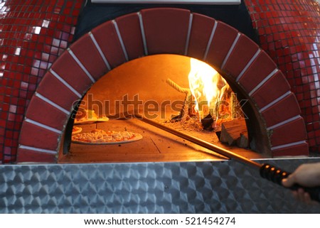 Pizza in a wood oven